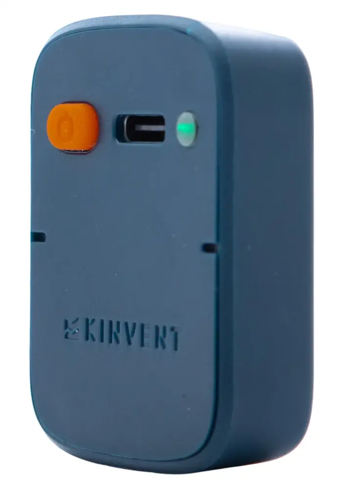 A 3D product render of the blue Kinvent K-Move motion sensor device isolated on a transparent background, displaying its compact casing, logo, orange power button, and charging port