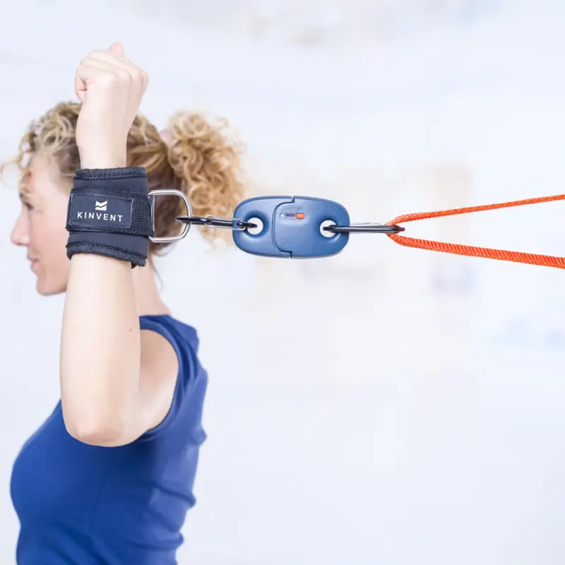 a woman is doing an assessment with the K-Pull from Kinvent providing objective data