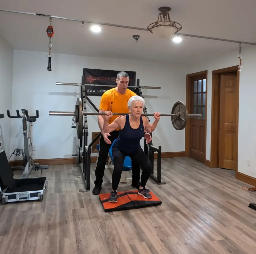 From Guesswork to Data: A Smarter Approach to Rehabilitation & Performance 4 back squat training with elder lady